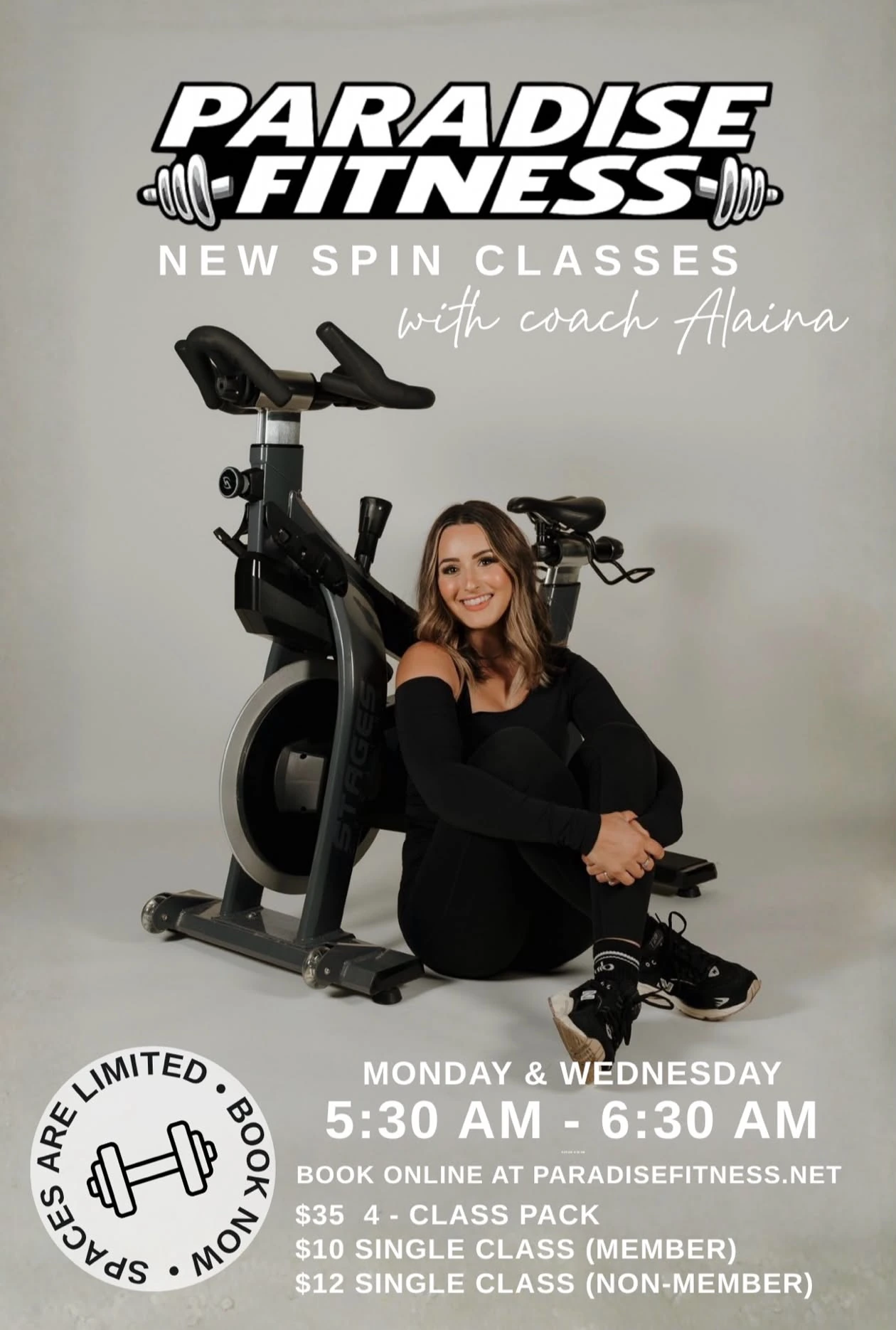Coach Alaina with a spin bike